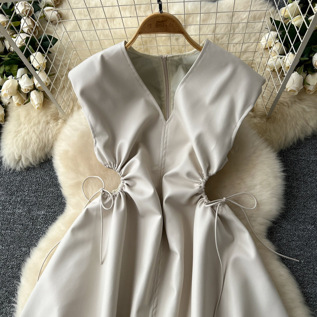 V-neck Sleeveless Hollowed PU Dress