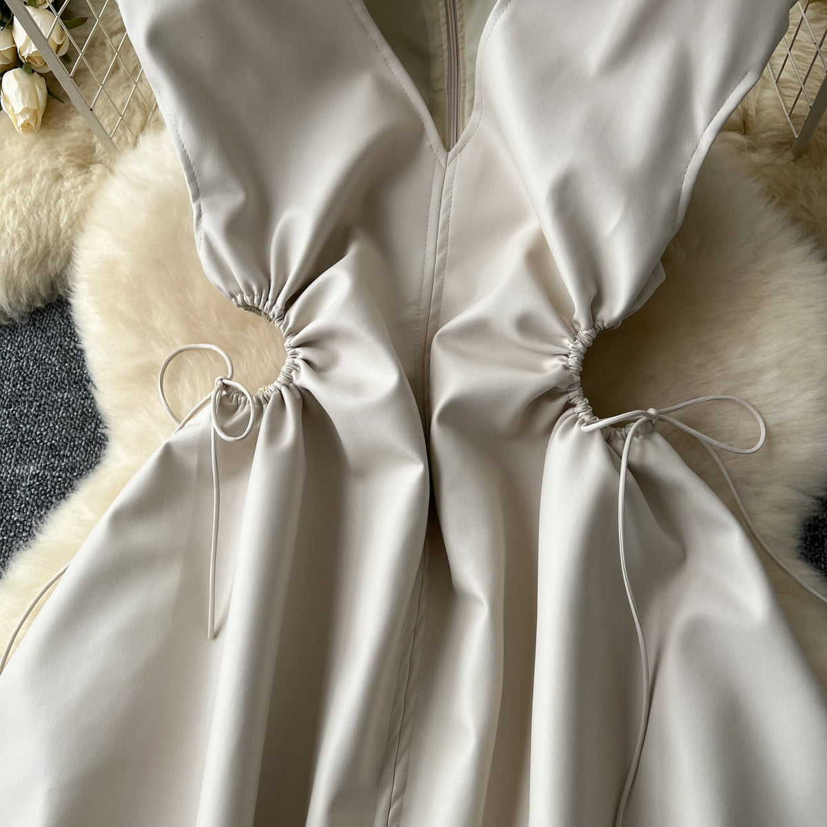 V-neck Sleeveless Hollowed PU Dress