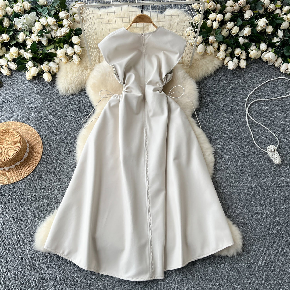V-neck Sleeveless Hollowed PU Dress
