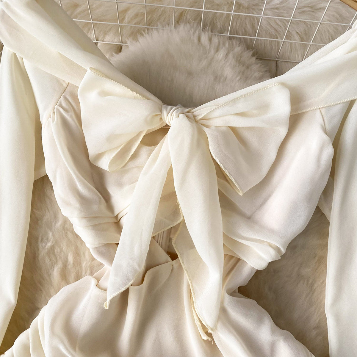 Off-shoulder Bow Hollowed Puffy Sleeve